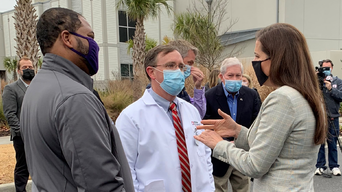 Rep. Nancy Mace meeting with medical professionals at a drive-thru vaccination site